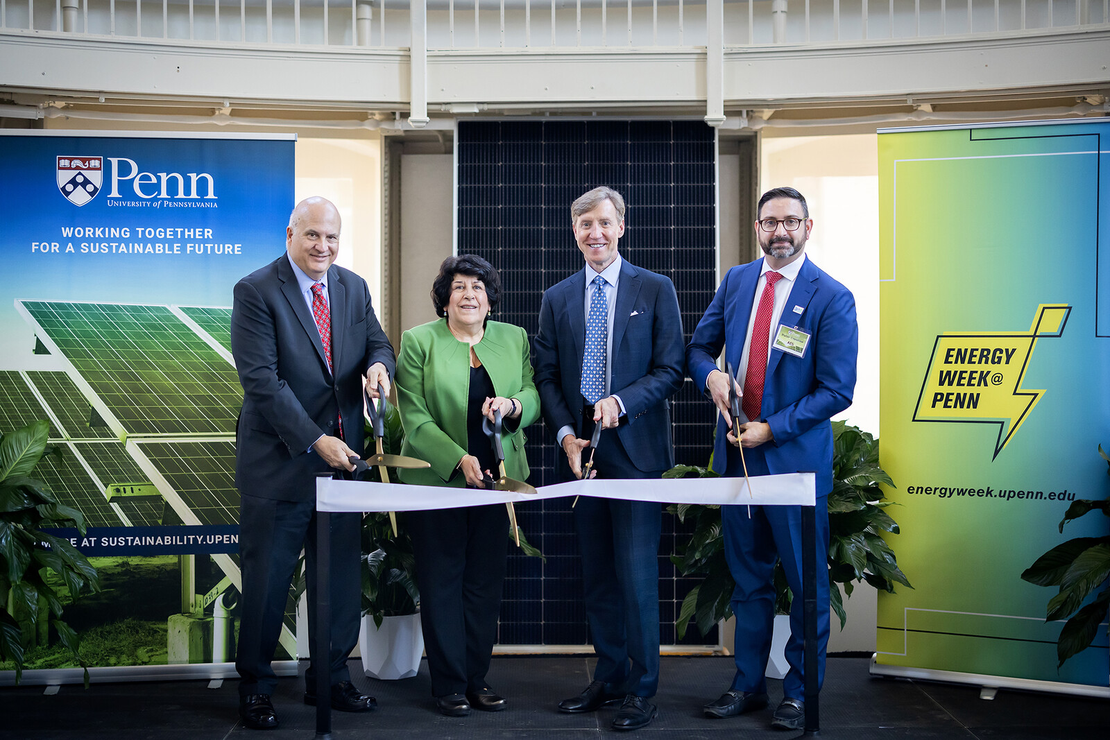 solar panel ribbon cutting with interim president jameson