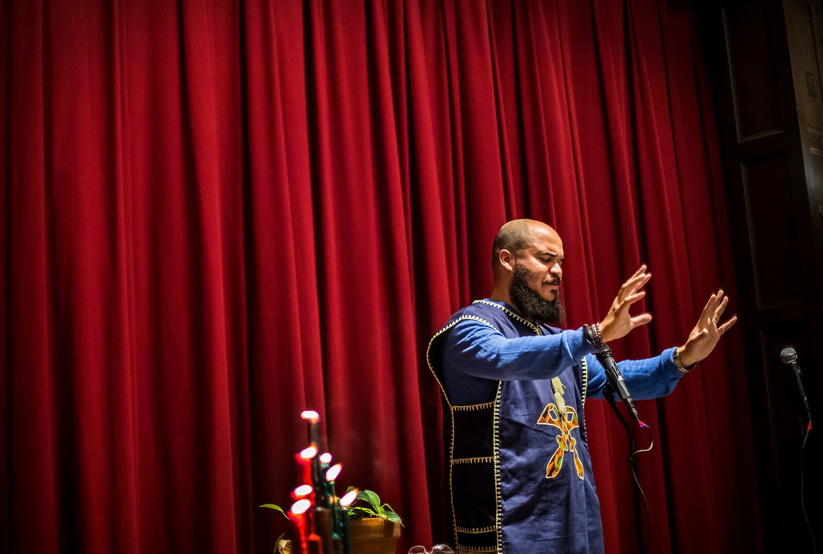 university chaplain during prayer service