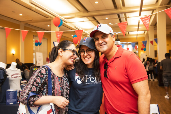 parents with child at new student orientation event